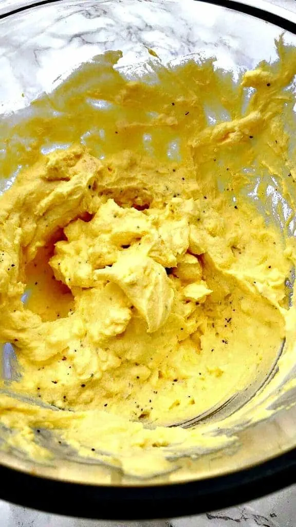 deviled egg mixture in a glass bowl