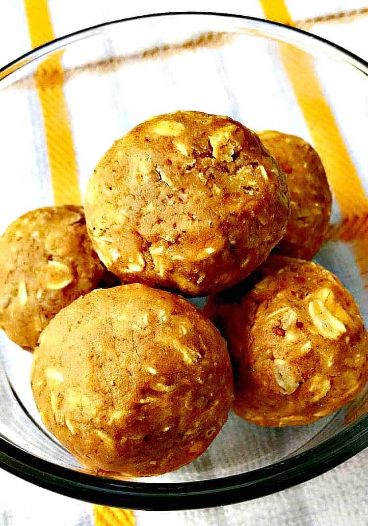 5 peanut butter energy protein balls in a glass bowl