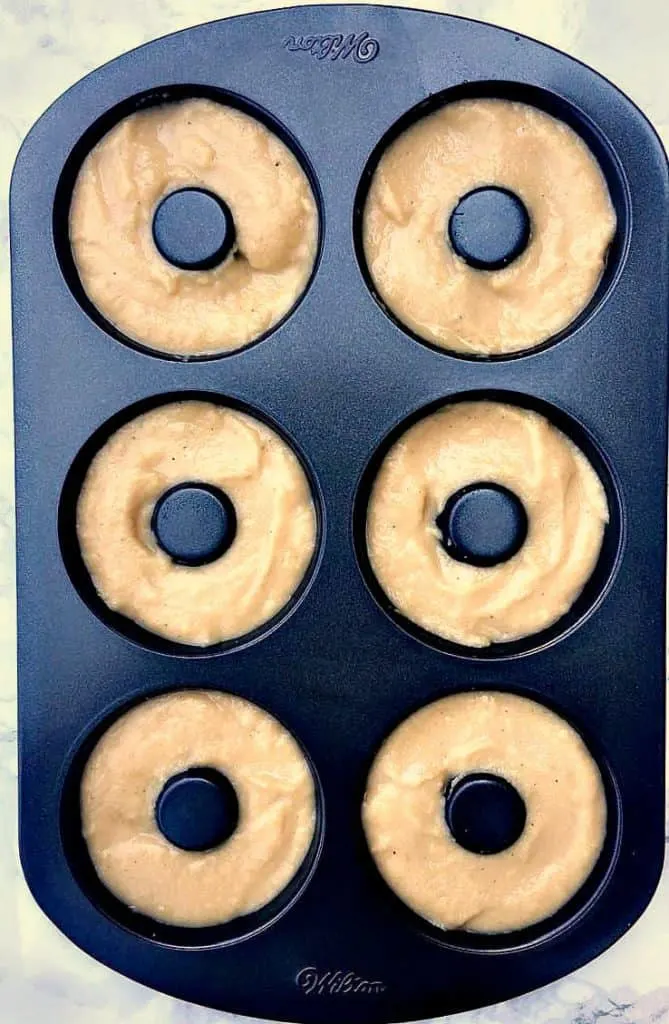 protein donut mix in a donut maker pan