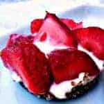 close up of frozen strawberry greek yogurt bite on a white plate