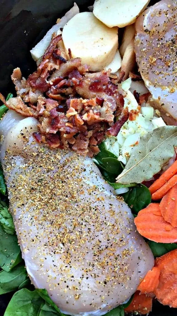 raw chicken breast, bacon, veggies in a crock pot