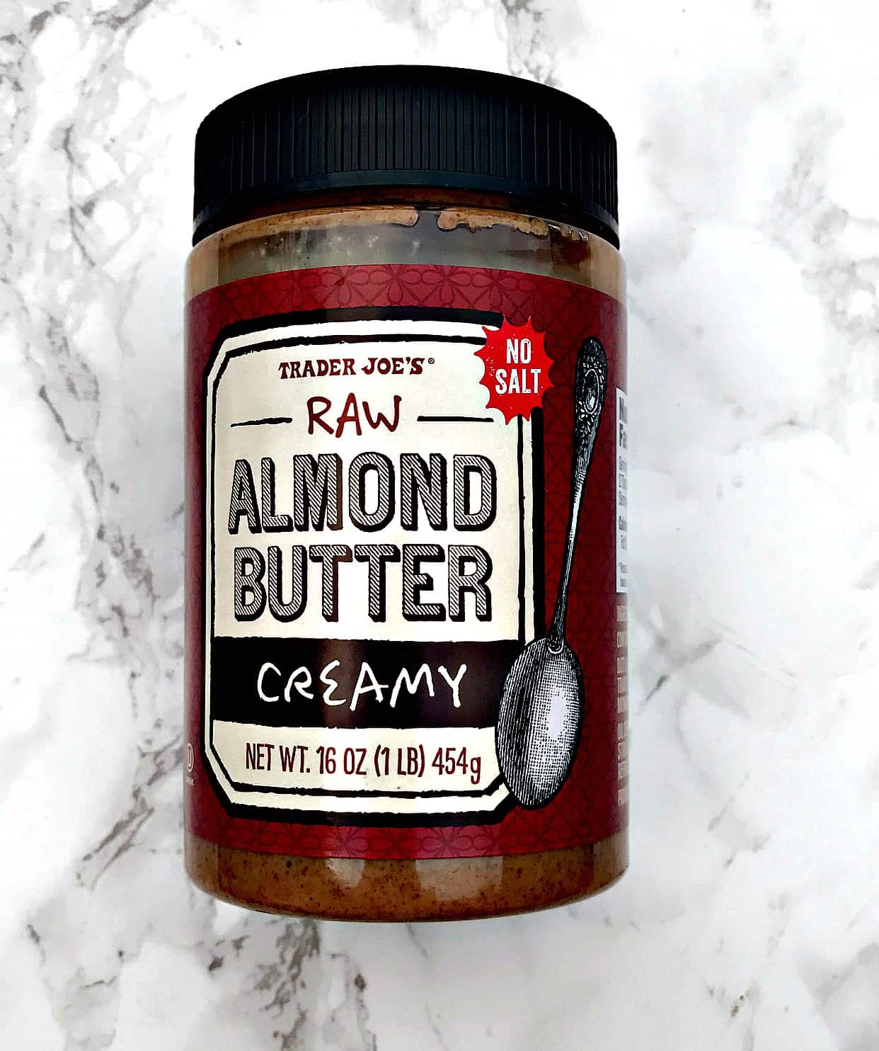 jar of creamy raw almond butter
