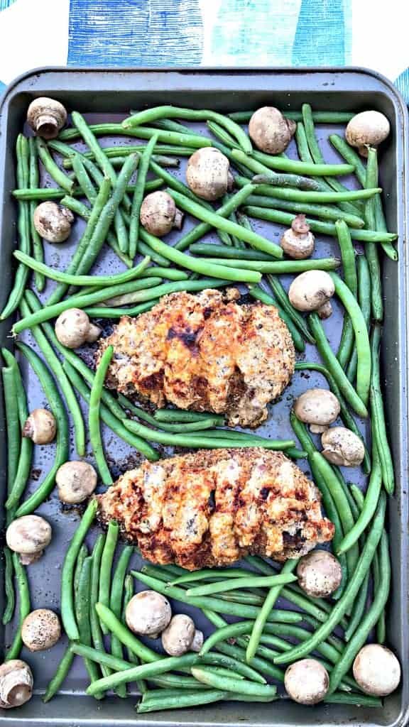 sheet pan almond crusted chicken stuffed with smoked cheddar and bacon