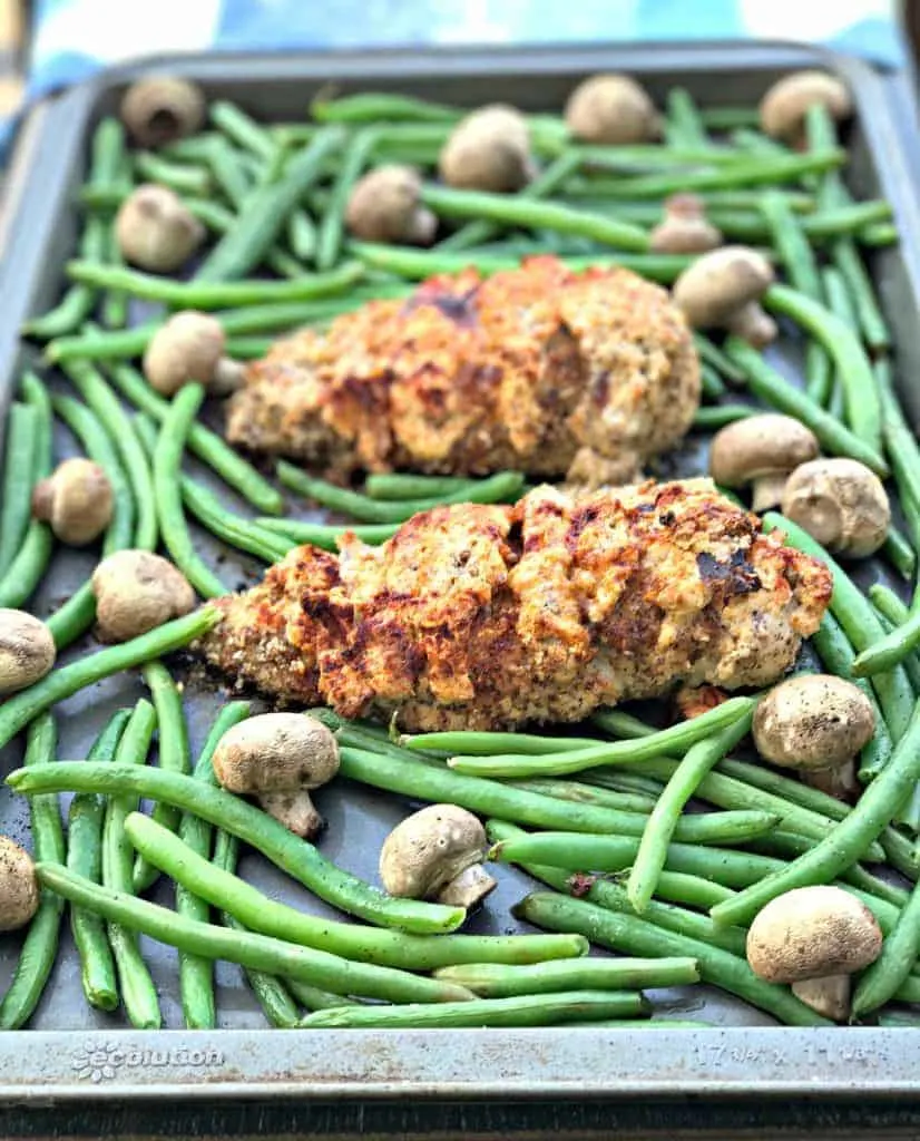 sheet pan almond crusted chicken stuffed with smoked cheddar and bacon