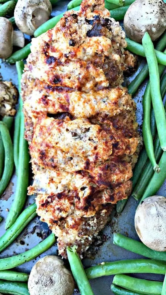 sheet pan almond crusted chicken stuffed with smoked cheddar and bacon