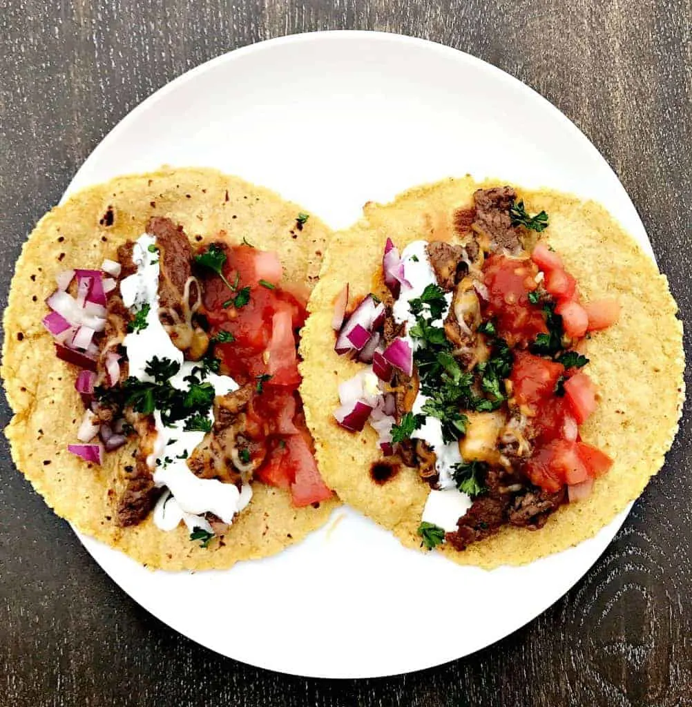 Instant Pot 10-Minute Steak Tacos (carne asada) on a white plate