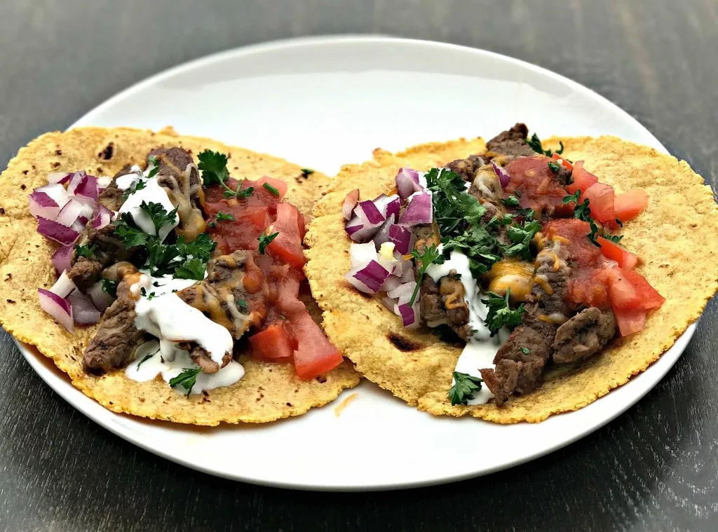 Instant Pot 10-Minute Steak Tacos on a white plate