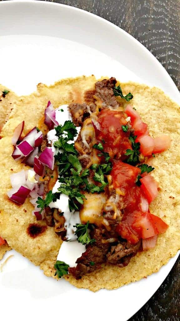 Instant Pot 10-Minute Steak Tacos (carne asada) with sour cream and tomatoes