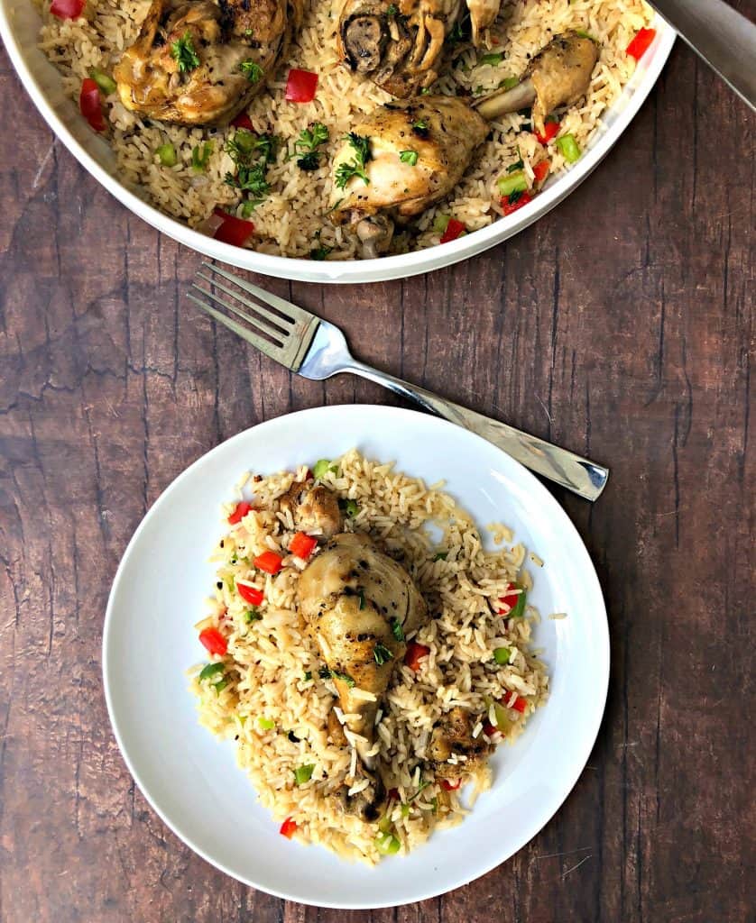 arroz con pollo in a white bowl