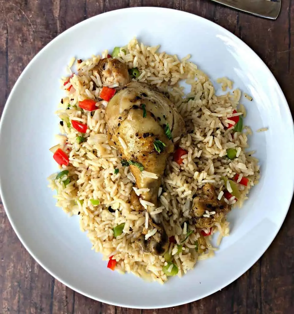 arroz con pollo in a white bowl