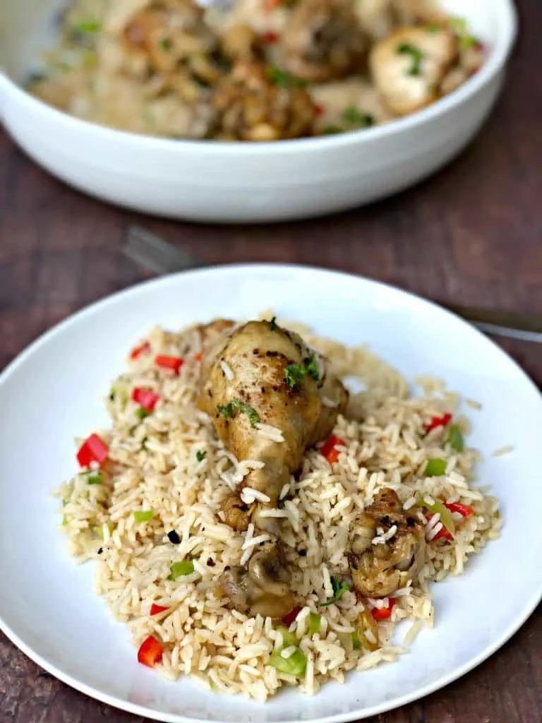 arroz con pollo in a white bowl