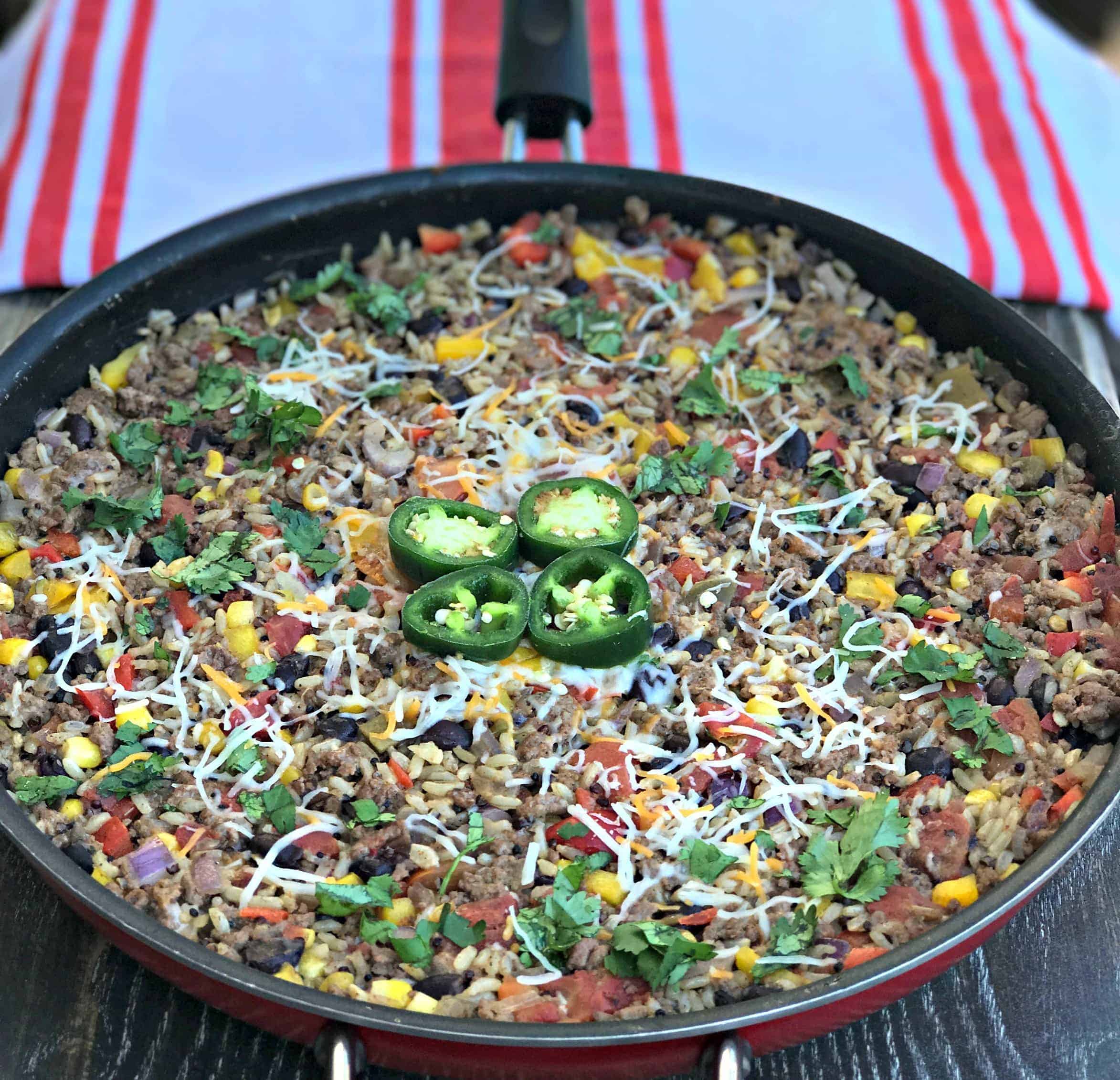 beef taco quinoa and brown rice in a skillet