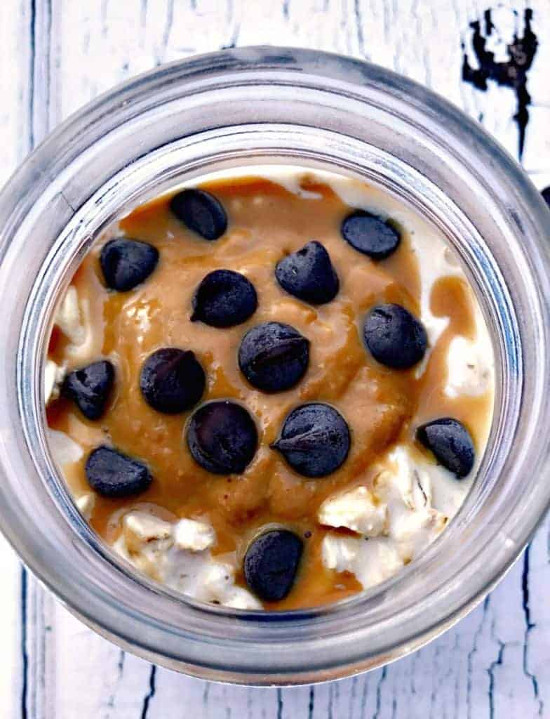 Chocolate Chip Cookie Dough Protein Overnight Oats in a glass jar