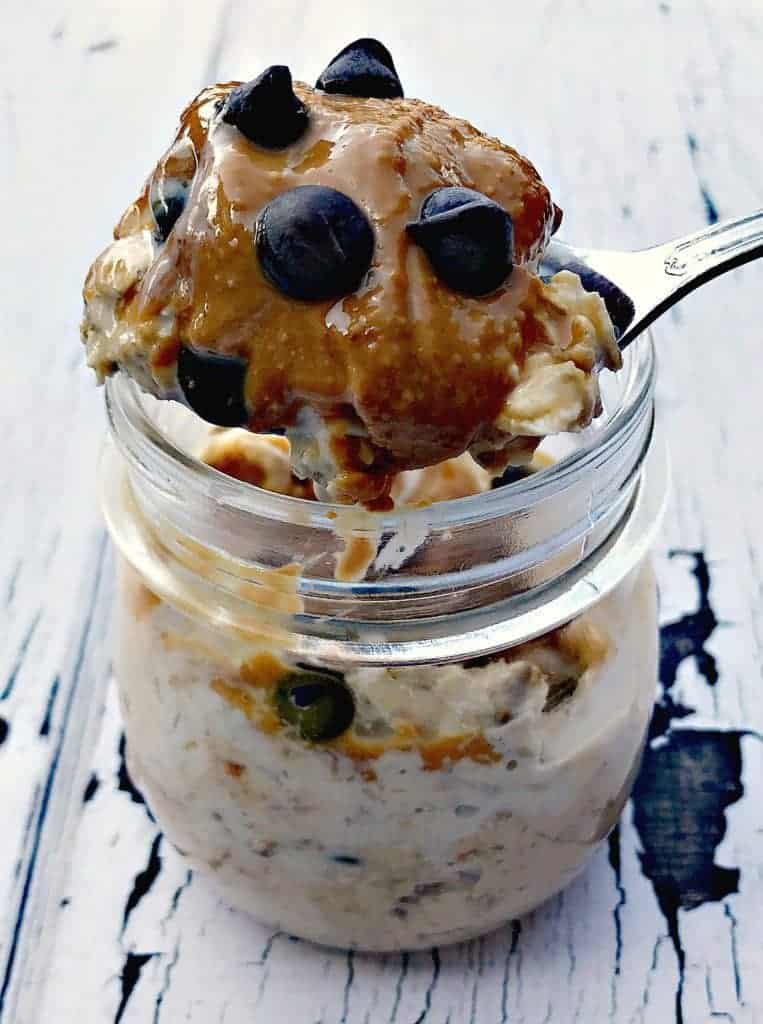 Chocolate Chip Cookie Dough Protein Overnight Oats in a glass jar