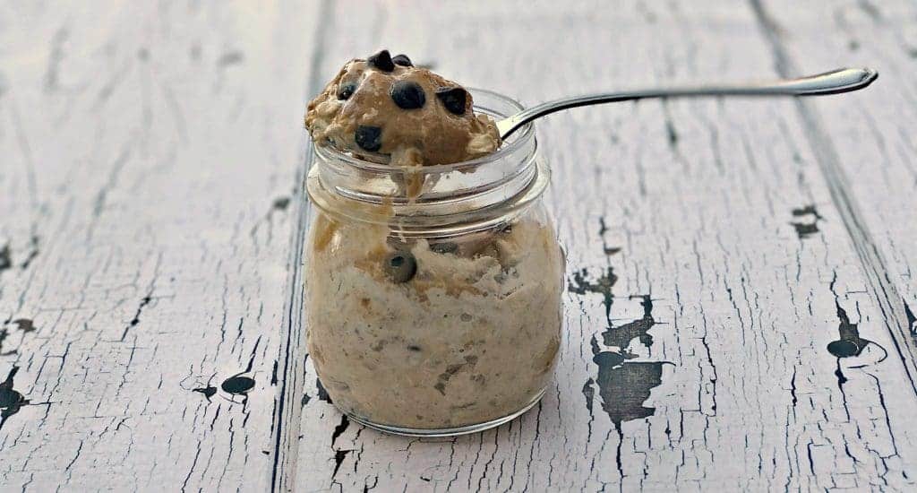 Chocolate Chip Cookie Dough Protein Overnight Oats in a glass jar