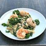 Lemon Shrimp Risotto with Vegetables and Parmesan served on a white plate