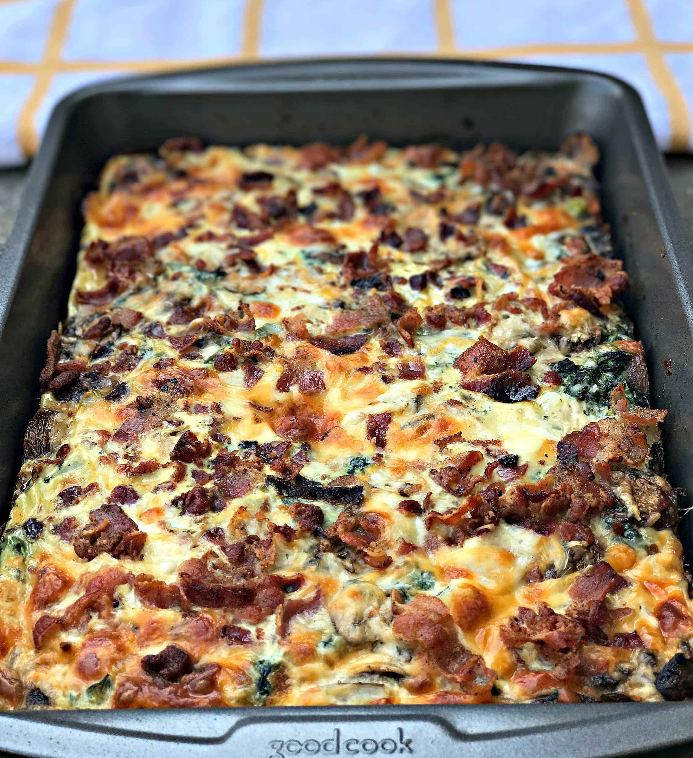 Bacon Ranch, Potato, Egg, and Spinach Breakfast Casserole in a baking dish