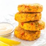 air fryer crab cakes on a white plate with fresh lemon