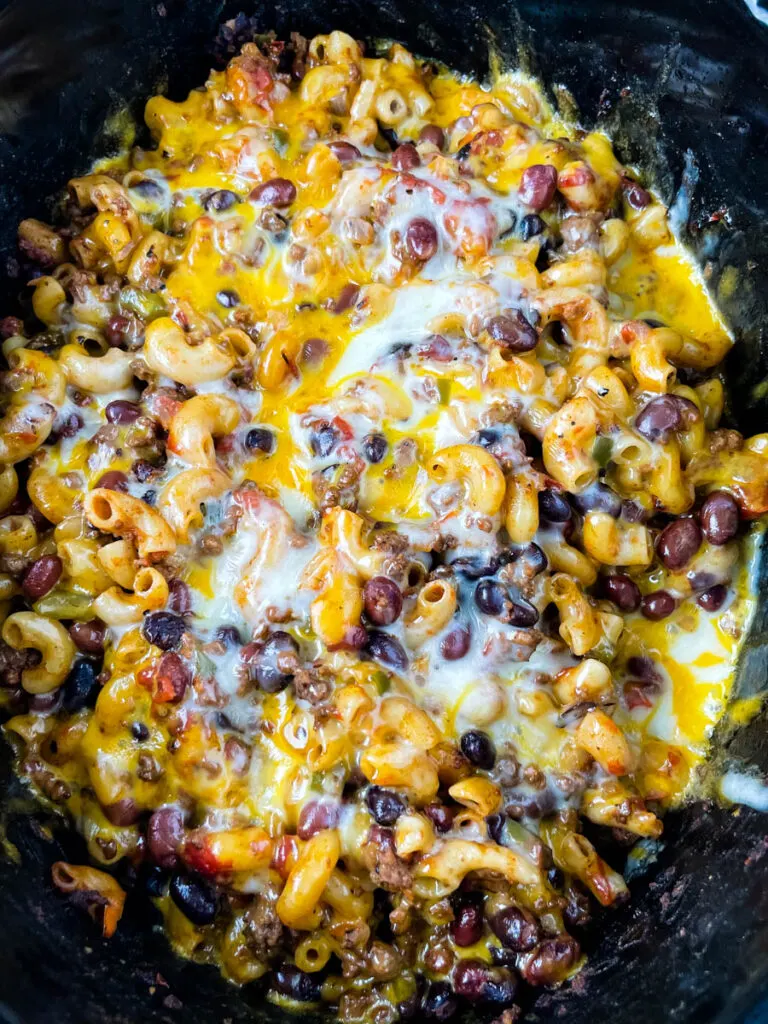 chili mac and cheese in a Crockpot slow cooker