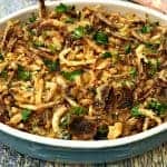 instant pot green bean casserole with cheese in a serving dish
