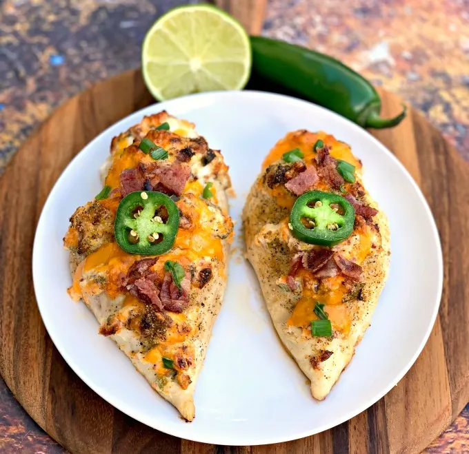 keto low carb jalapeno popper hasselback chicken on a white plate