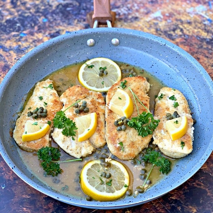 keto lemon chicken piccata in a skillet