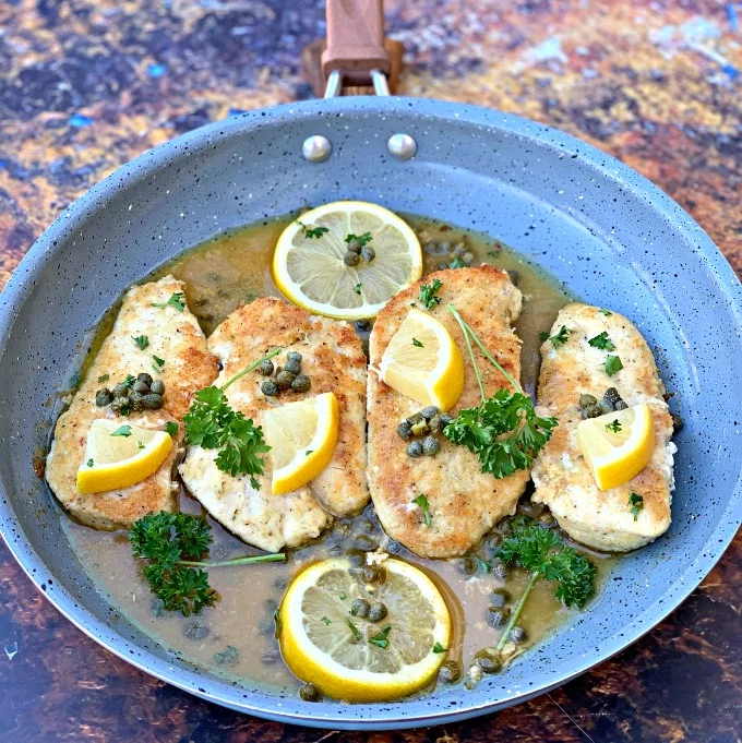 keto lemon chicken piccata in a skillet