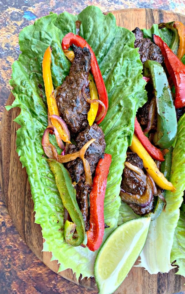 keto low carb steak fajitas on a lettuce wrap