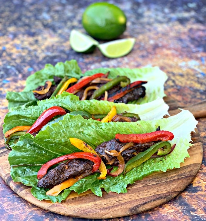 keto low carb steak fajitas on a lettuce wrap