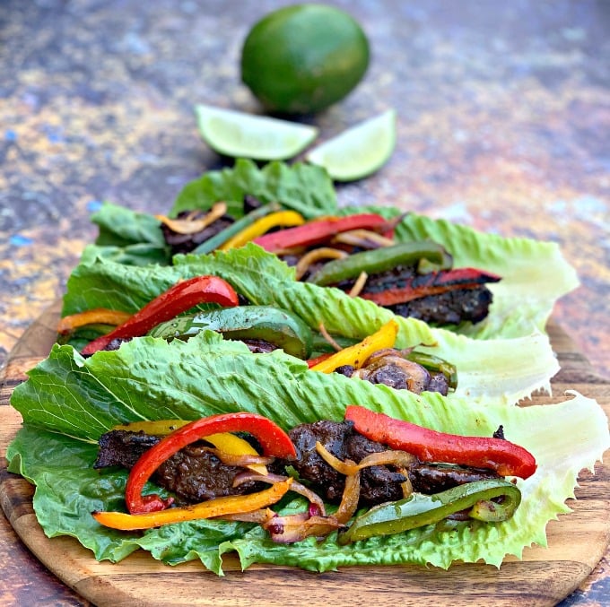 keto low carb steak fajitas on a lettuce wrap