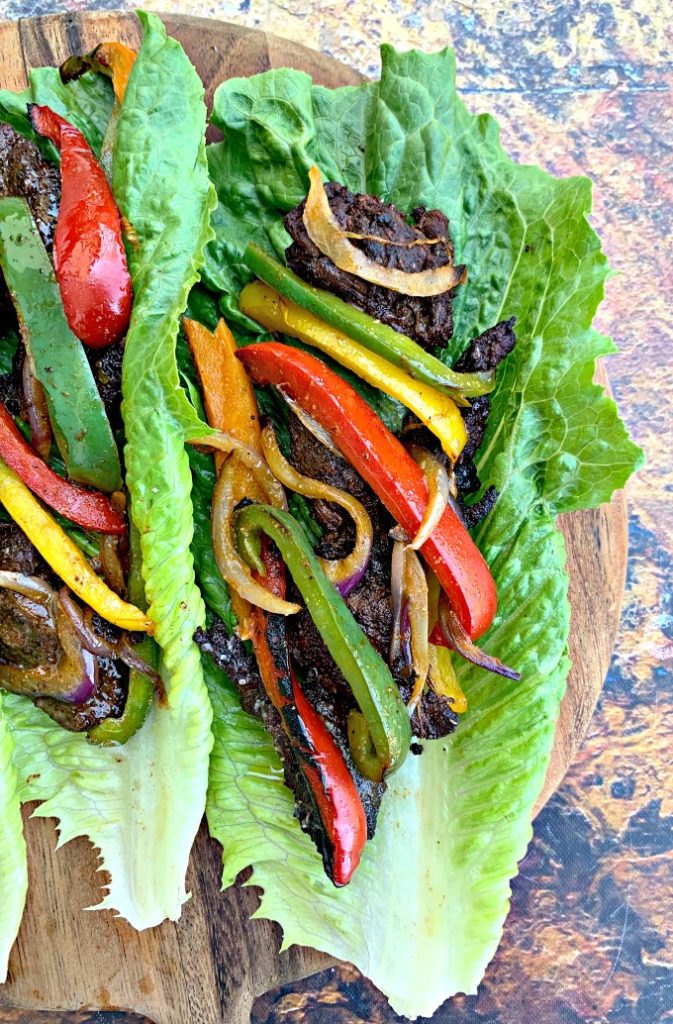 keto low carb steak fajitas on a lettuce wrap