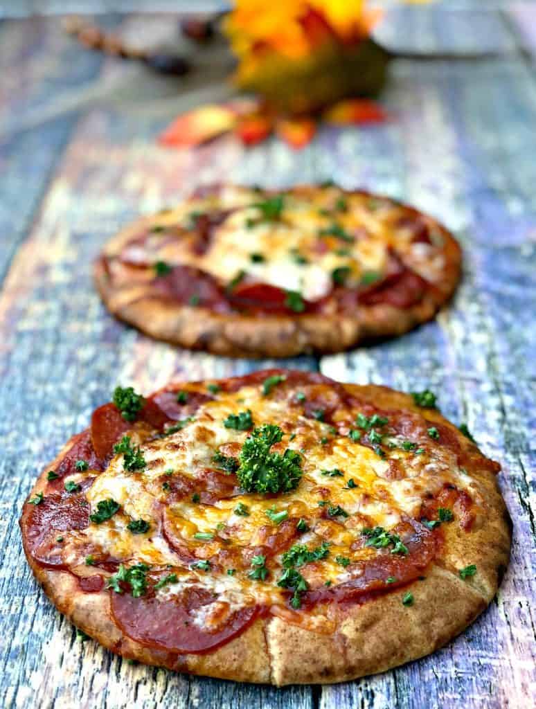 air fryer pepperoni pizza with mozzarella cheese in a multi colored surface