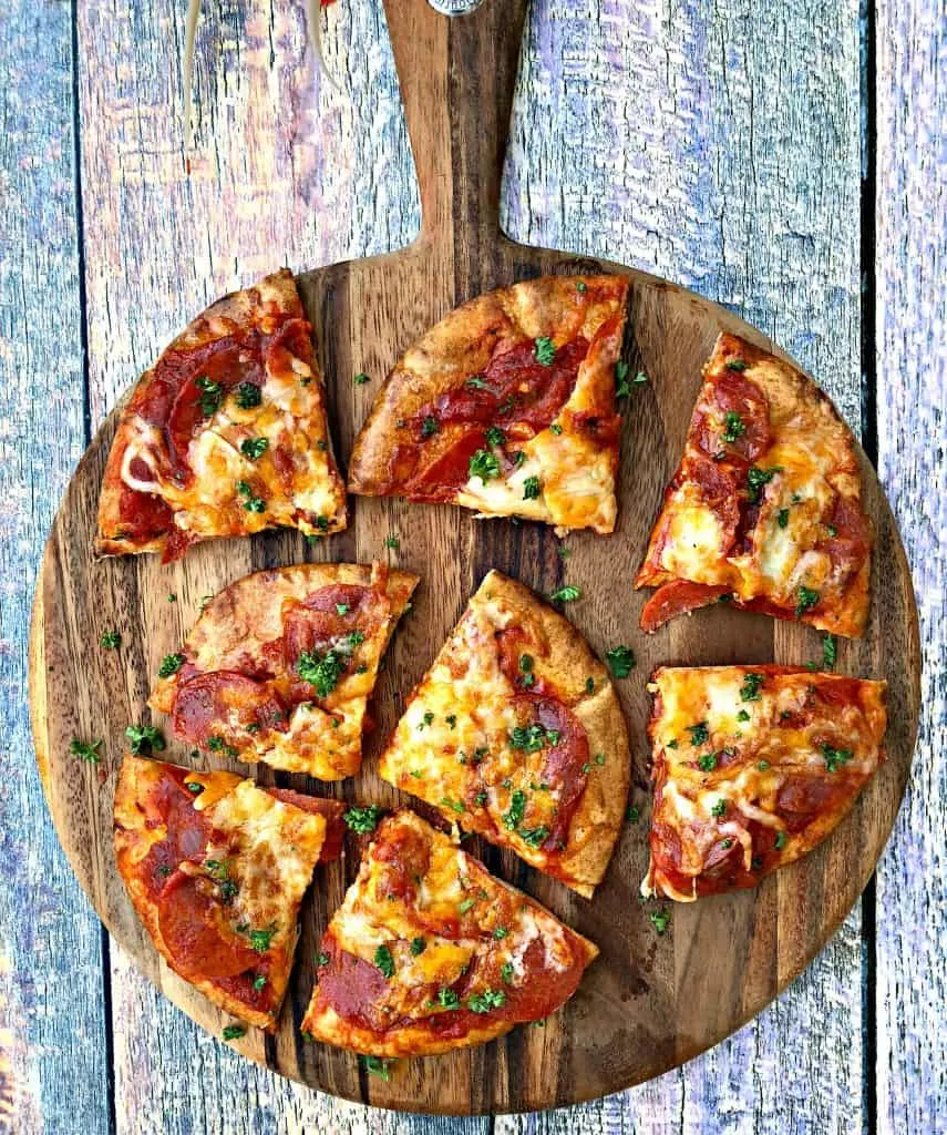 air fryer pepperoni pizza with mozzarella cheese in a multi colored surface