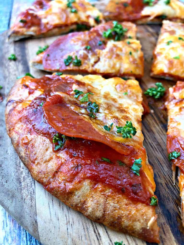 air fryer pepperoni pizza with mozzarella cheese in a multi colored surface