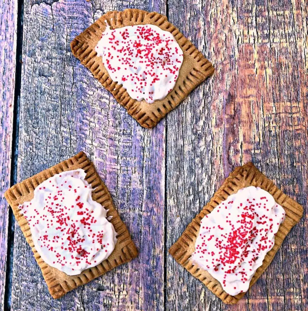 air fryer strawberry pop tarts on a multi color surface