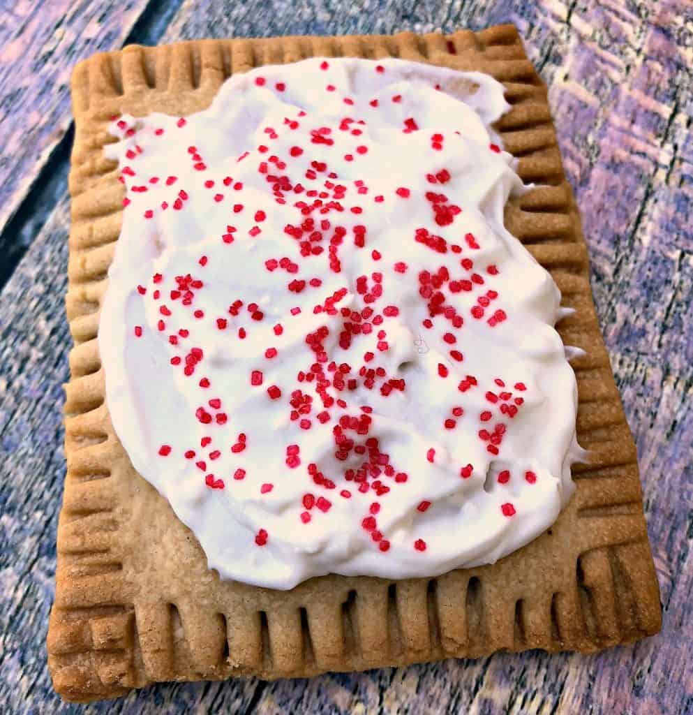 air fryer strawberry pop tarts on a multi color surface