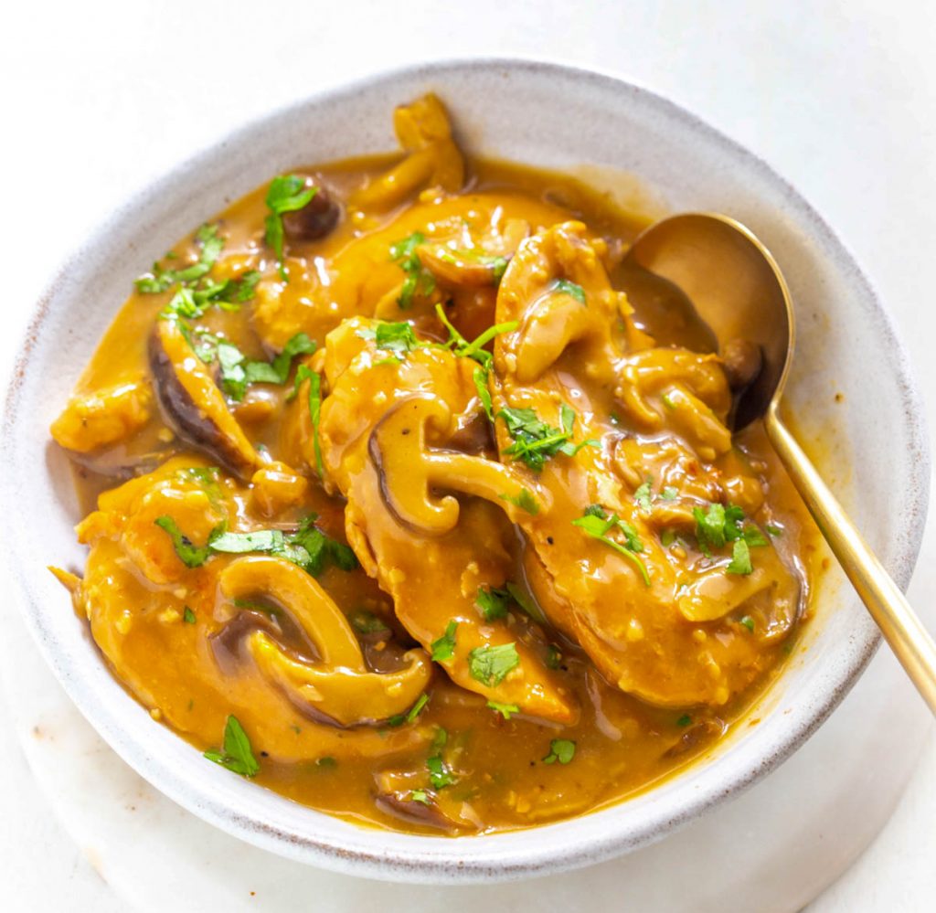 Instant Pot Chicken Marsala in a white bowl