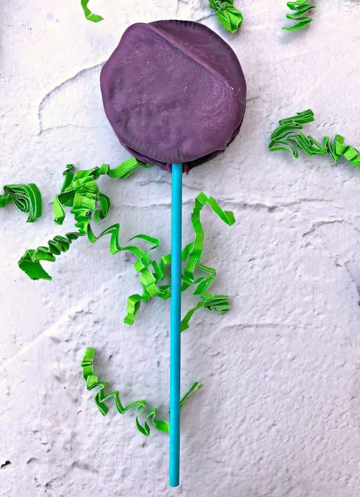 Easy 3 Ingredient Oreo Dessert Pops in a pail with Easter grass