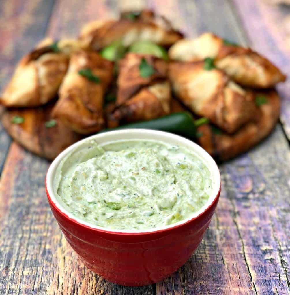 avocado ranch dip in a red bowl