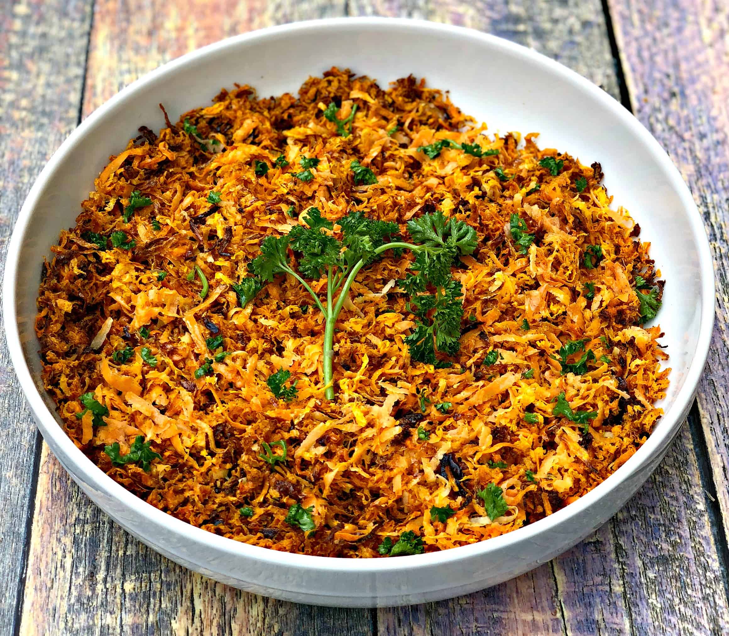 sweet potato hash browns in a white bowl