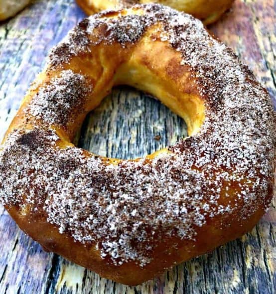 air fryer donuts header Air Fryer Cinnamon Sugar Donuts held in a hand