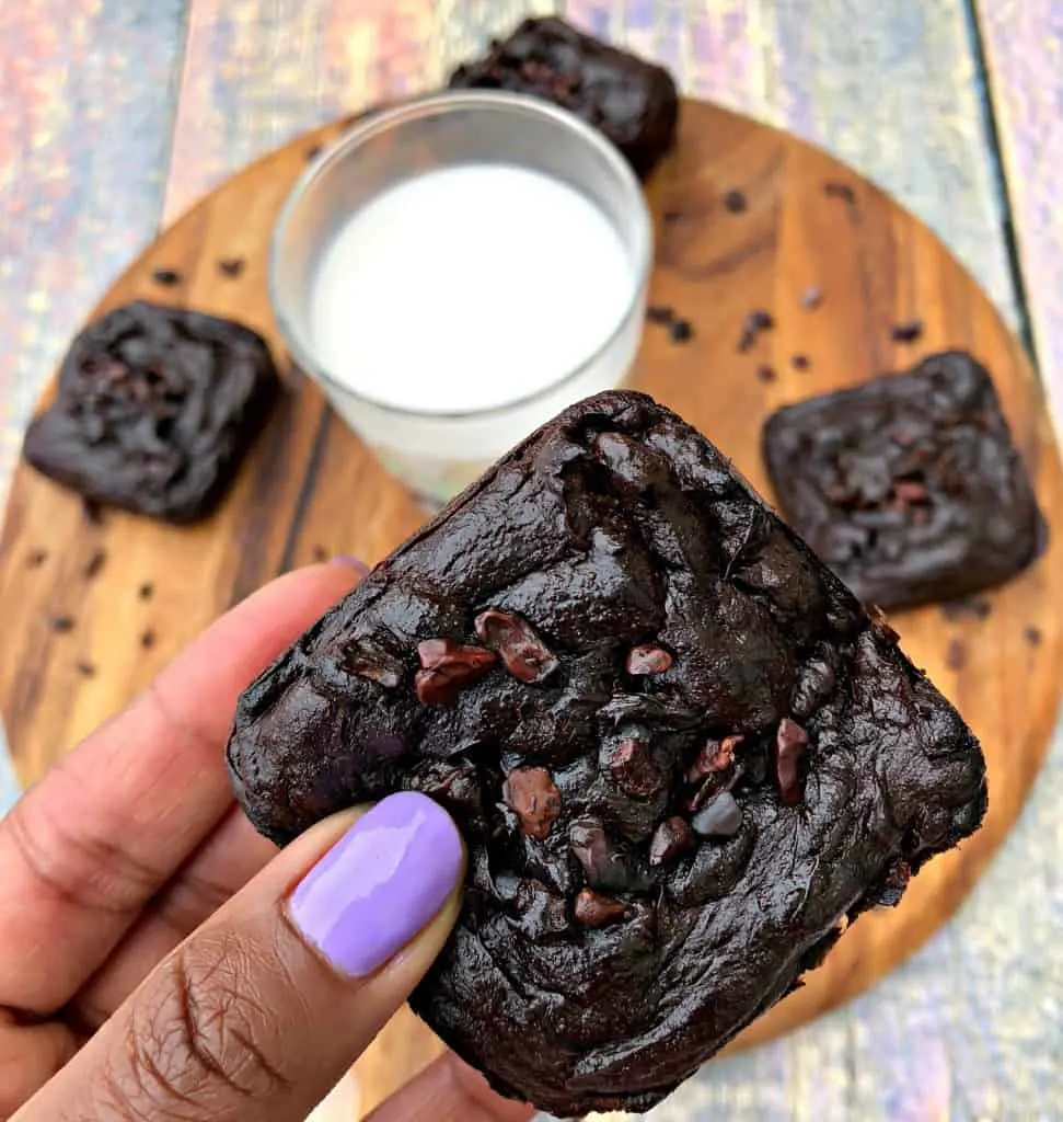 avocado brownies with milk on a brown cutting board