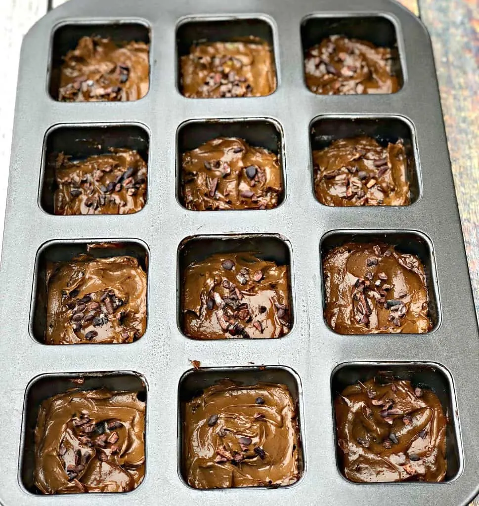 uncooked avocado brownies in a pan