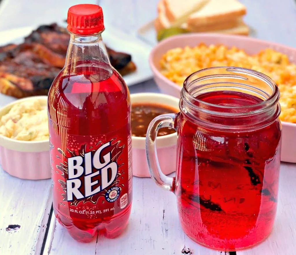 mac and cheese, red soda, with side dishes