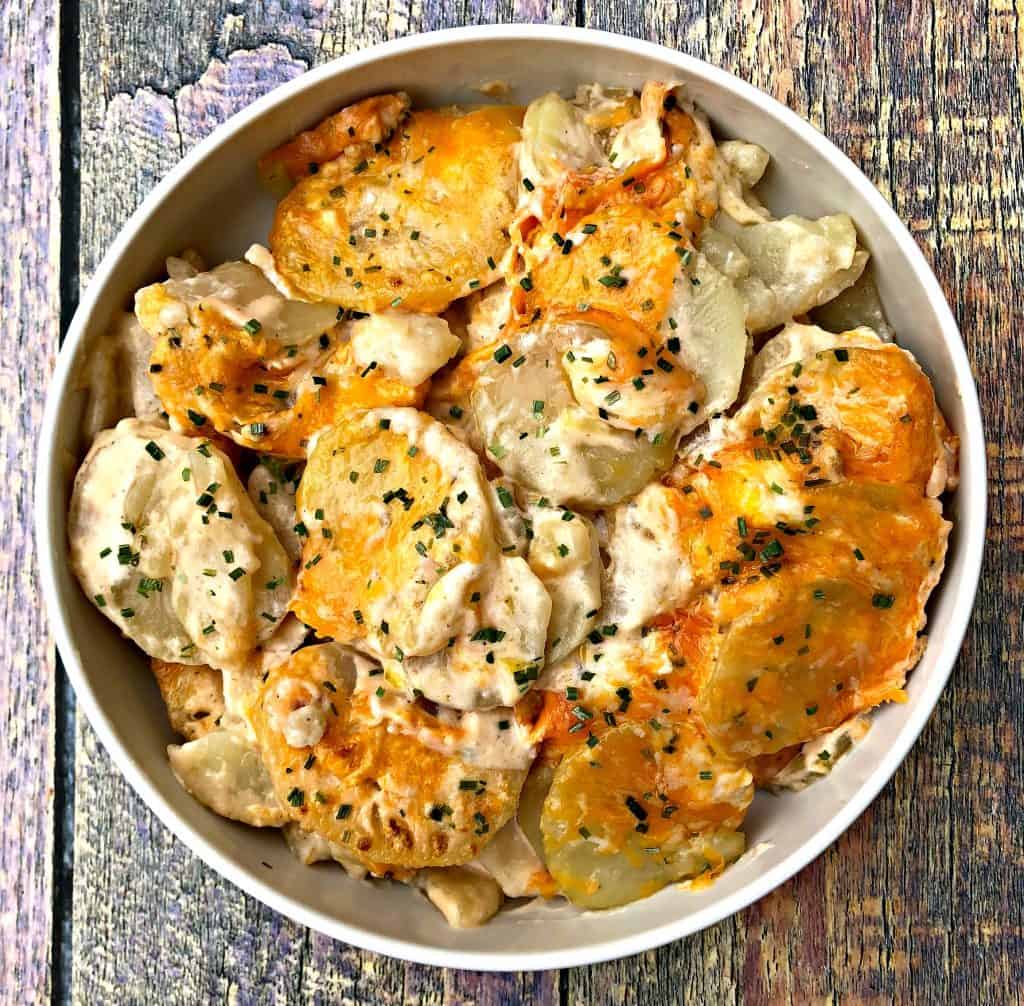 instant pot scalloped potatoes in a white bowl