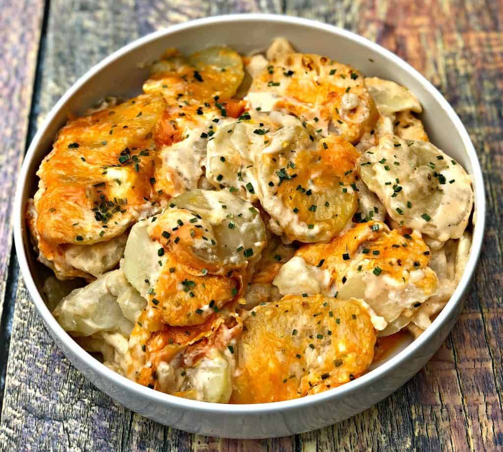 instant pot scalloped potatoes in a white bowl