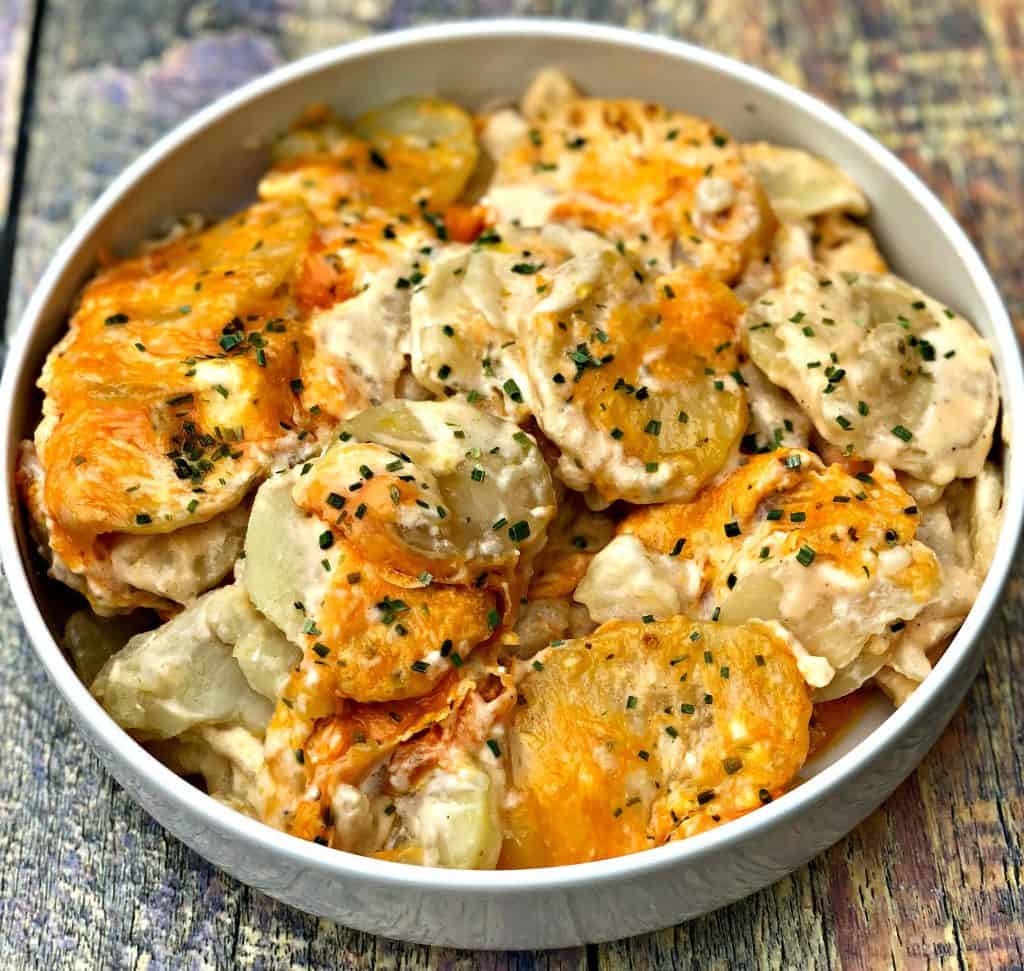 instant pot scalloped potatoes in a white bowl
