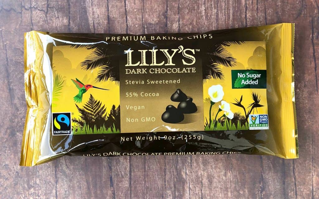 bag of Lily's chocolate sweetened with stevia on a flat brown surface