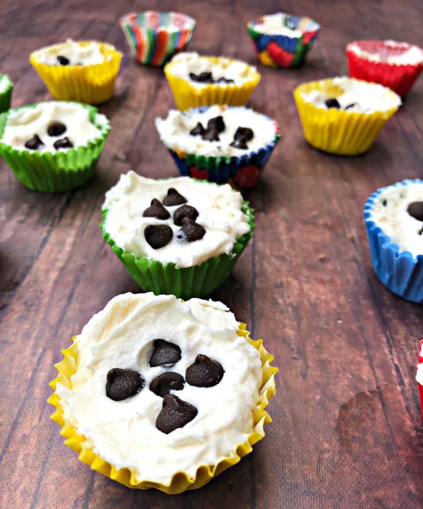 cheesecake fat bombs on a flat surface