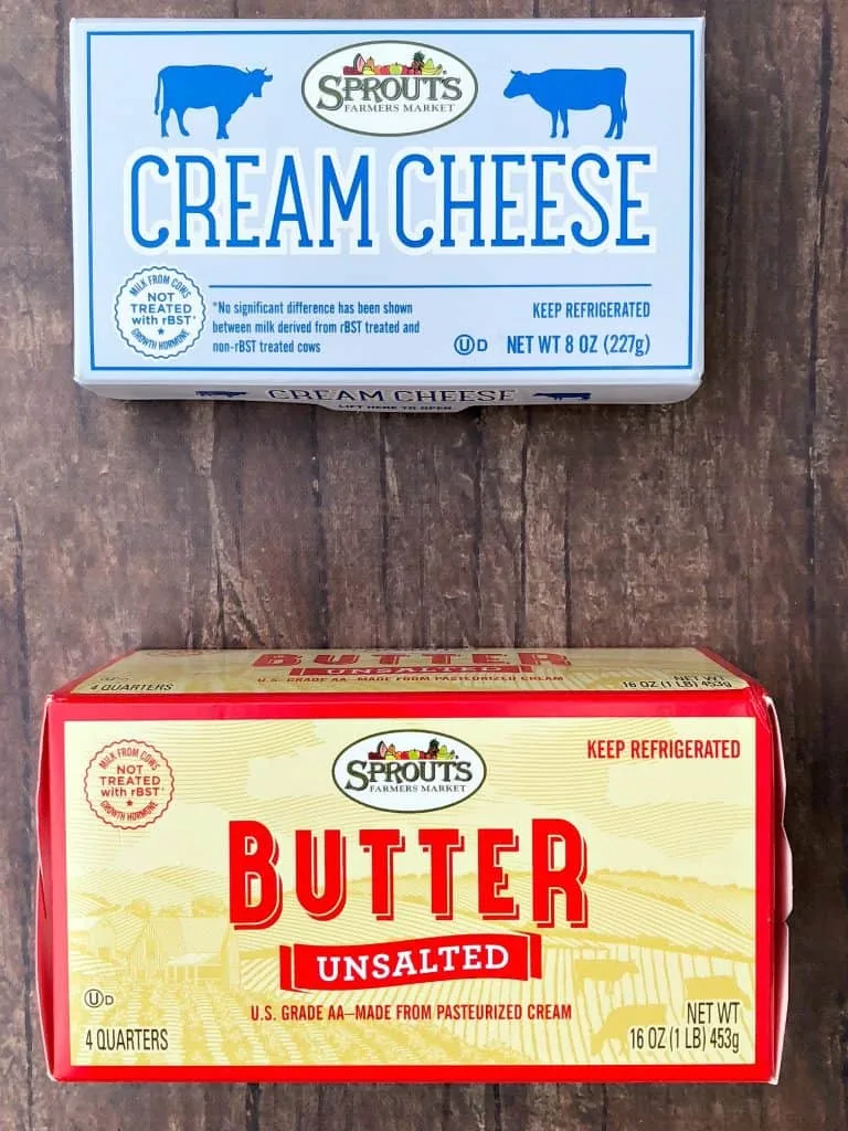 packages of butter and cream cheese on a flat surface